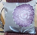 Embroidered cushion pair