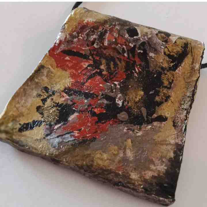 Hand-painted pendant necklace.