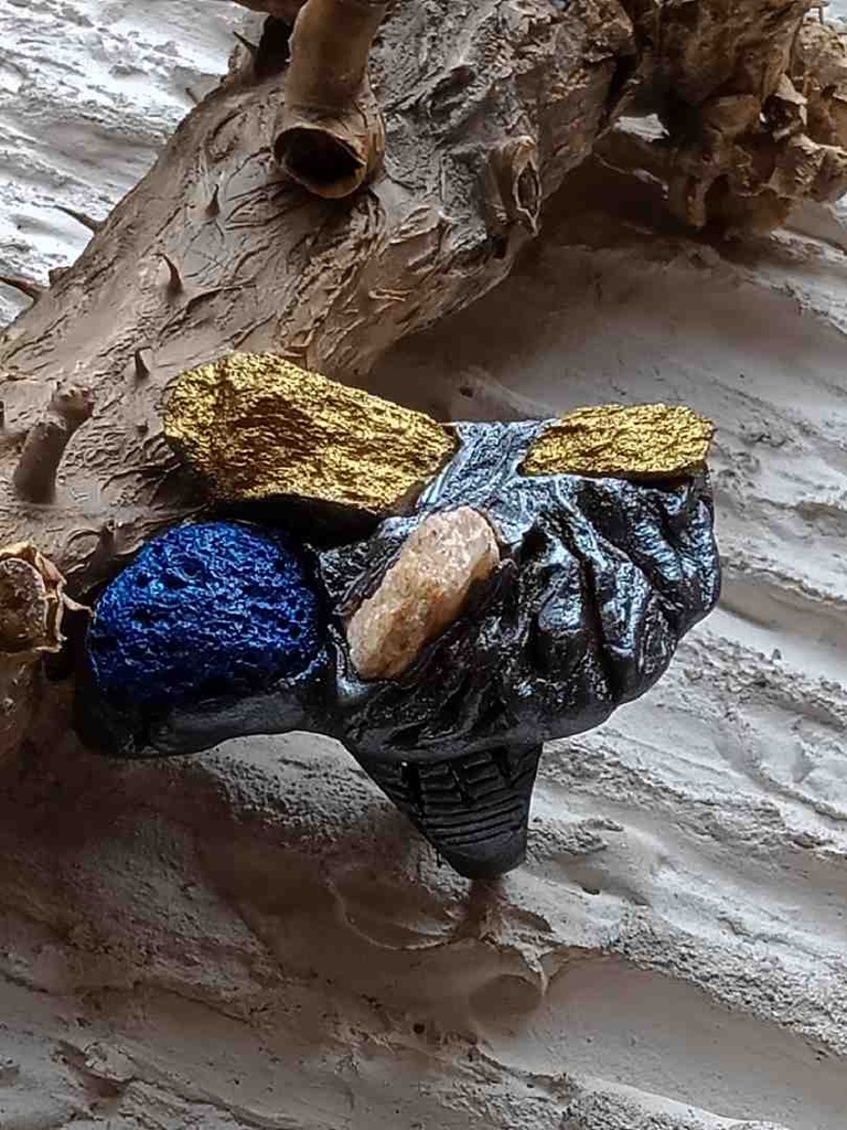 Raw stones ring hand sculpted.