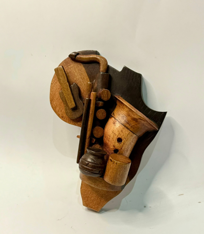 Carved Instrumental Wall Hanging